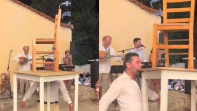 Τρομερός τύπος έγινε viral: Χορεύει ζεϊμπέκικο κρατώντας με τα δόντια του ένα τραπέζι και μια καρέκλα (video)